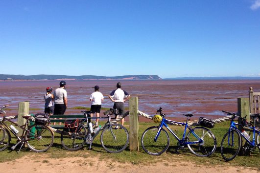 A view of the Bay of Fundy at low tide resulting in spectacular scenery while cycling along its coasts with Freewheeling Adventures.