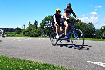Cycling on a tandem bike on quiet roads and bike paths along the Navigator’s Route - the south shore of the Saint Lawrence River on our Bas-Saint-Laurent Bike with Freewheeling Adventures