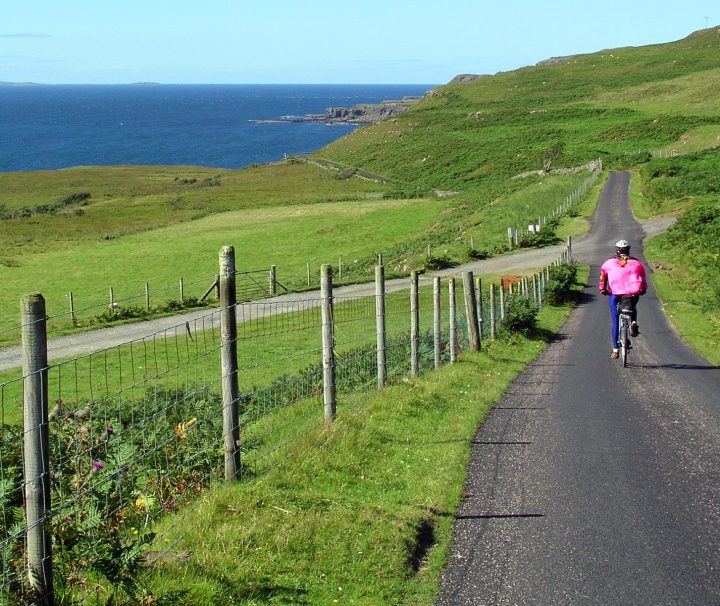 Travel by bike with Freewheeling Adventures along quiet, single-track roads with varying terrain along the glens, lochs, rivers, seashores, and across wide open moors of western Scotland.