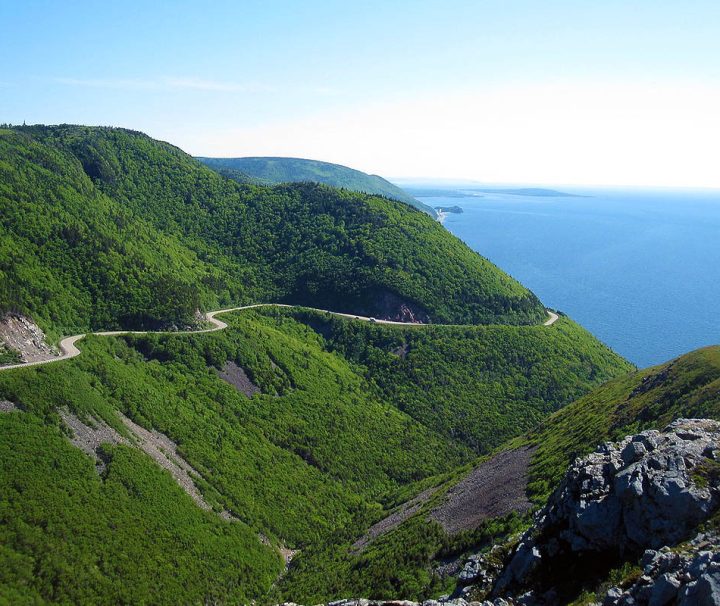 This photograph captures a scenic view of the Cabot Trail on Cape Breton Island, Nova Scotia