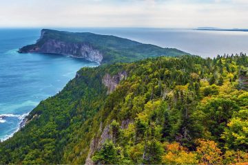 This image shows the dramatic coastal scenery of Forillon National Park on the Gaspé Peninsula in Quebec