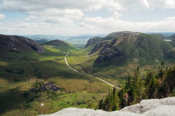 This image shows the Saguenay Fjord National Park in Quebec, Canada, during the autumn season