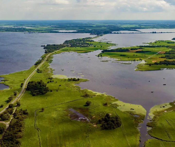 This image shows a high-angle aerial view of Weerribben-Wieden National Park