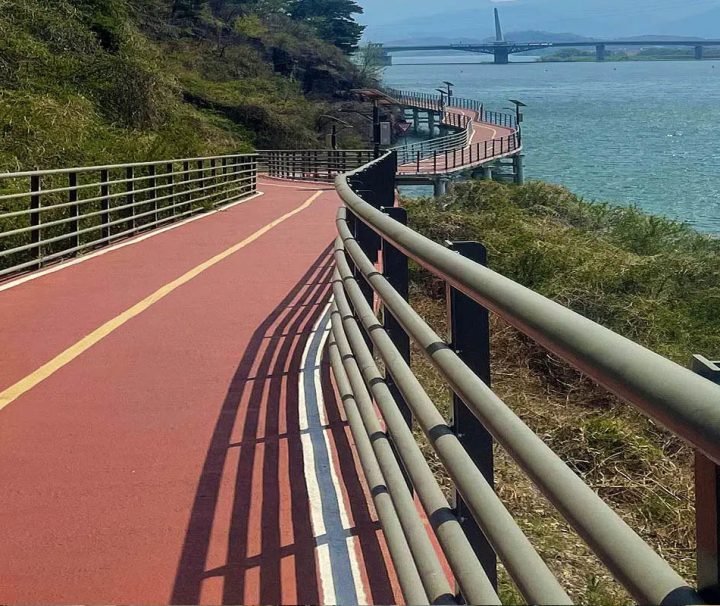 This image shows a portion of the Four Rivers Bike Path in South Korea, a popular long-distance cycling route connecting major cities like Seoul and Busan