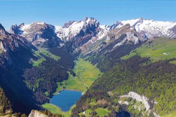The stunning Seealpsee lake located in the Alpstein mountain range of Switzerland