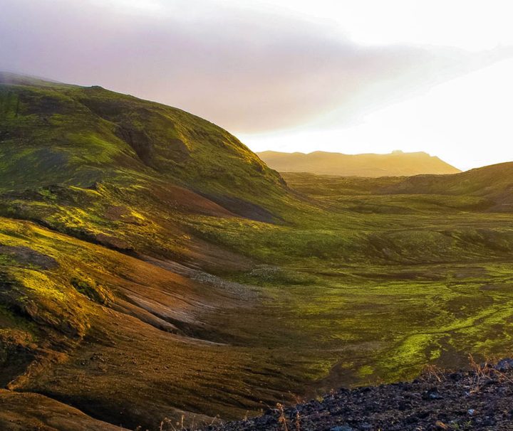 This image shows the vibrant landscapes of Landmannalaugar in the Fjallabak Nature Reserve within the Highlands of Iceland